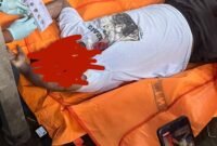 Mayat Mr X saat ditemukan di kios penjual pisan di dekat Fly Over di Desa Karang Rejo, Kecamatan Stabat, Langkat.