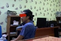 Tersangka ZS (33) di ruang Unit Perlindungan Perempuan dan Anak (PPA) Polres Langkat.