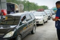 Suasana Gerbang Ruas Tol Binjai - Langsa Seksi Tanjung Pura pada momen arus balik Lebaran Idul Fitri 1445 H.