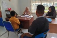 RP, siswa Kelas XIII SMP PABAKU didampingi keluarganya di UPTD PPA KAbuapten Langkat.