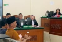 Ilham Mahmudi dan Taufik menjalani persidangan di Pengadilan Negeri Stabat, Kamis (4/7/2024) sore.