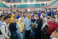 Paslon Cabup dan Cawabup Langkat SATRIA dengan Nomor Urut 1 foto bersama relawan, tim pemenangan dan masyarakat.