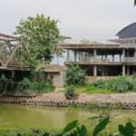 Bangunan milik Yus yang didirikan di DAS, bahkan di dalam tanggul Sei Batang Serangan