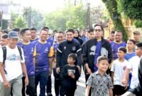 Riki dan Rico saat berjalan santai bersama seribuan warga Medan Petisah.