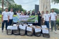 Gen Hijau usai bersih-bersih di areal CFD Stabat.