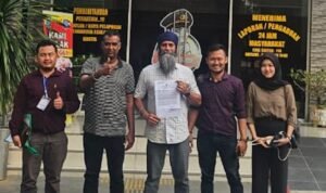 Ranjot Singh didampingi penasihat hukumnya membuat laporan di Mapolda Sumut