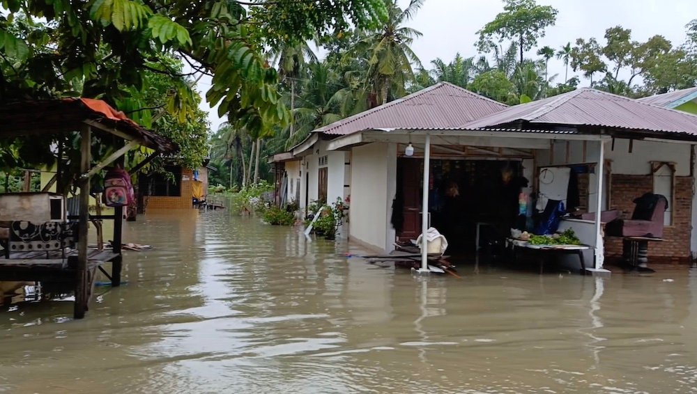 Rumah warga di Desa Pantai Gemi, Kecamatan Stabat, Langkat yang kebanjiran.