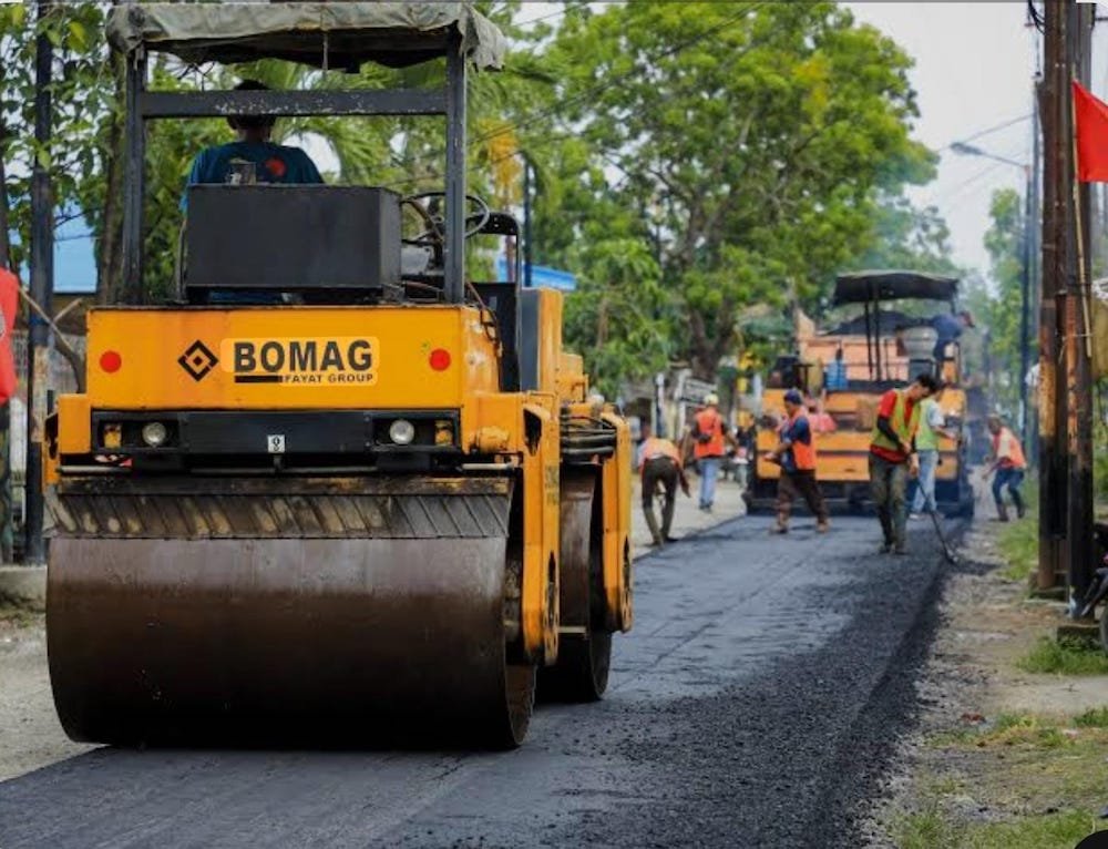 Ilustrasi pengerjaan konstruksi pengaspalan jalan