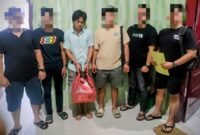 SH dan barang bukti kejahatan diapit Tim Deninteldam I/BB.