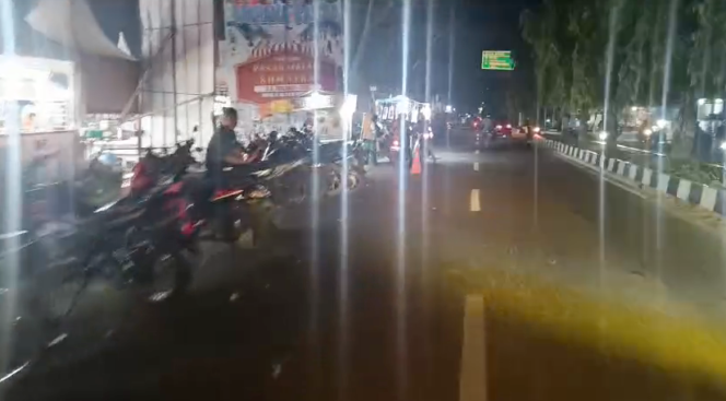 
Lokasi pasar malam di Jalan Proklamasi, Kelurahan Kwala Bingai, Kecamatan Stabat, yang digunakan untuk parkir liar.