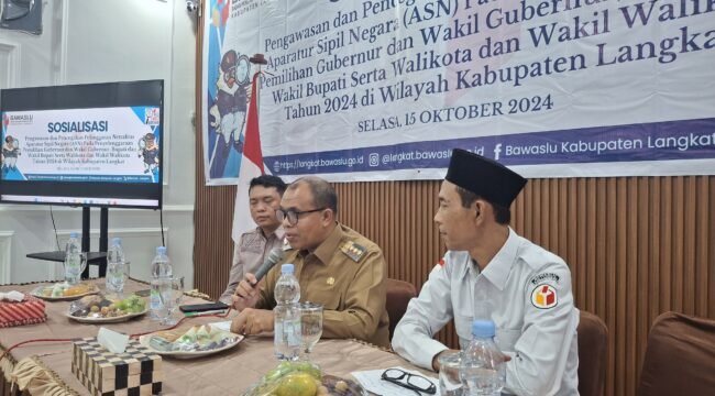 Pj Bupati Langkat dalam kegiatan sosialosasi yang digelar Bawaslu Langkat di Caffe Warisan Stabat.