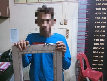 Mukti Ali, pelempar kaca jendela rumah Ramlan di Mapolsek Tangjung Pura.