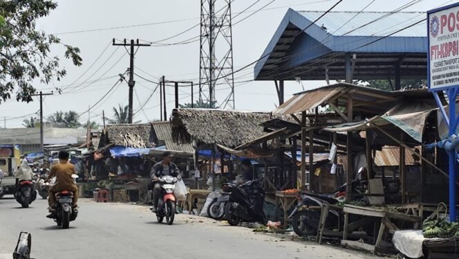 
Pasar Tradisional Tanjung Pura di Jalan Khairil Anwar, Kelurahan Pekan Tanjung Pura, Kecamatan Tanjung Pura, Langkat.